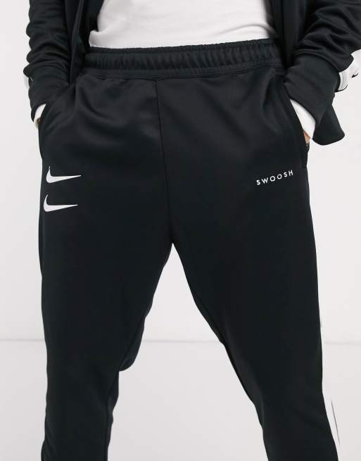 Nike polyknit track store pants in black