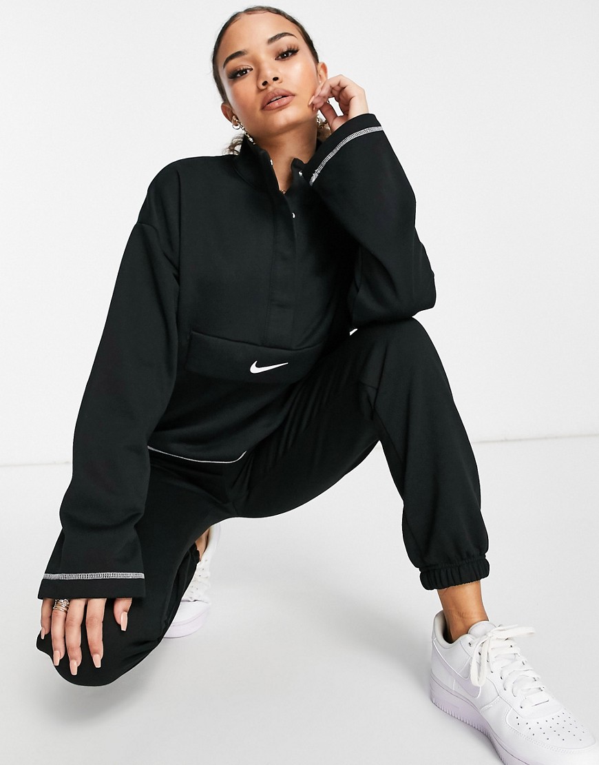 Nike Swoosh quarter zip funnel sweatshirt in black
