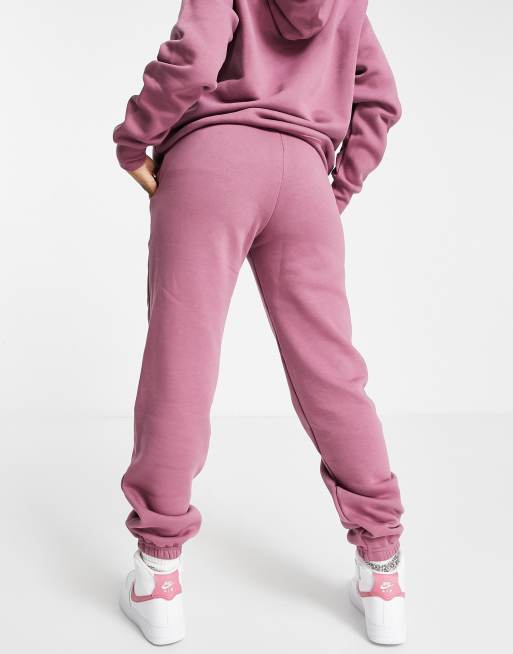 Nike stacked swoosh logo sweatpant pink new arrivals