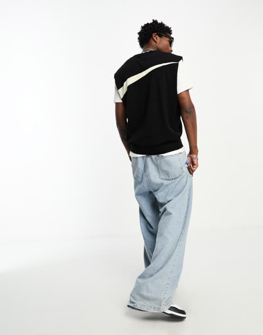 Nike Swoosh sweater vest in black and cream | ASOS