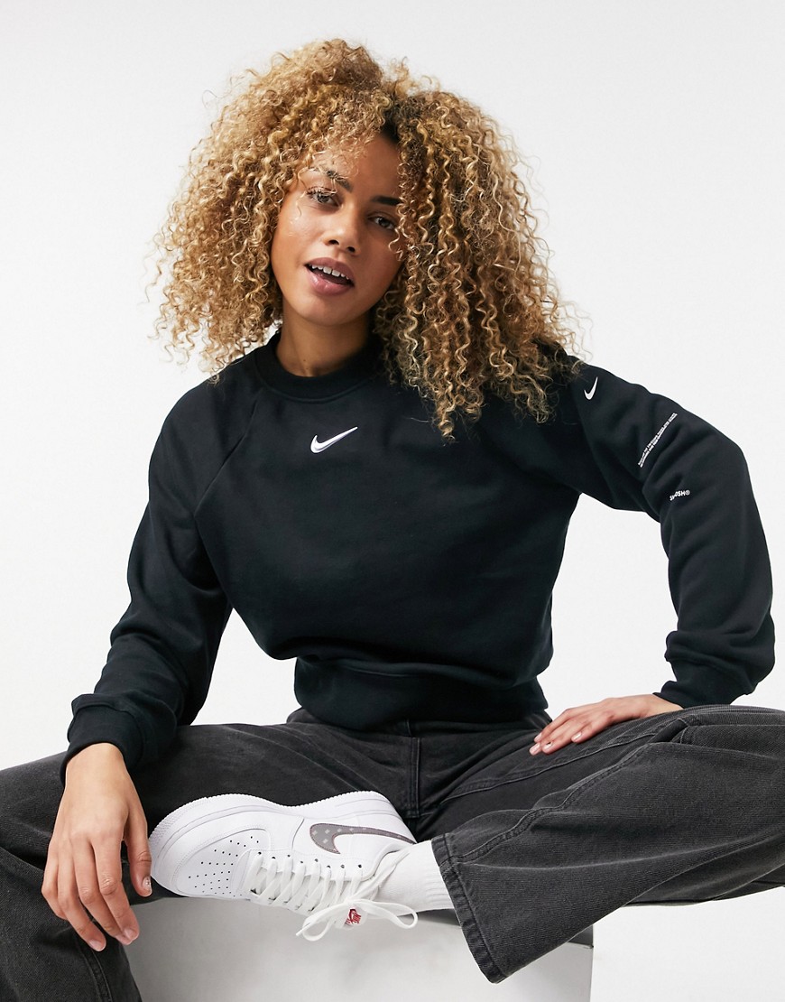 Nike Swoosh sweatshirt in black with crew neck