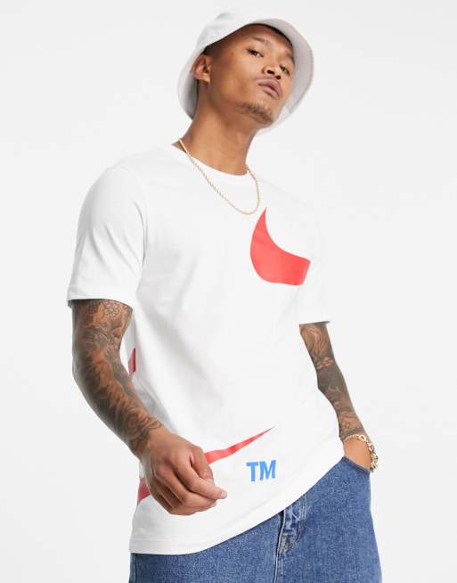 White nike shirt store with red swoosh