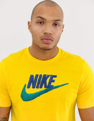 black nike shirt with yellow swoosh