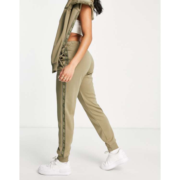 Nike swoosh polyknit joggers in khaki sale