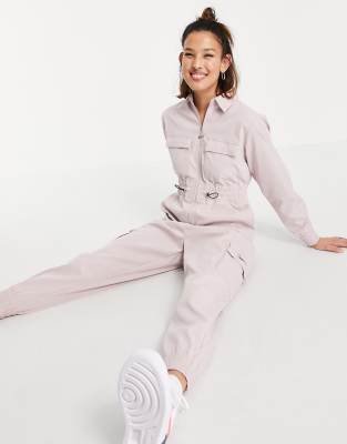 Nike Swoosh Plus utility jumpsuit in light pink