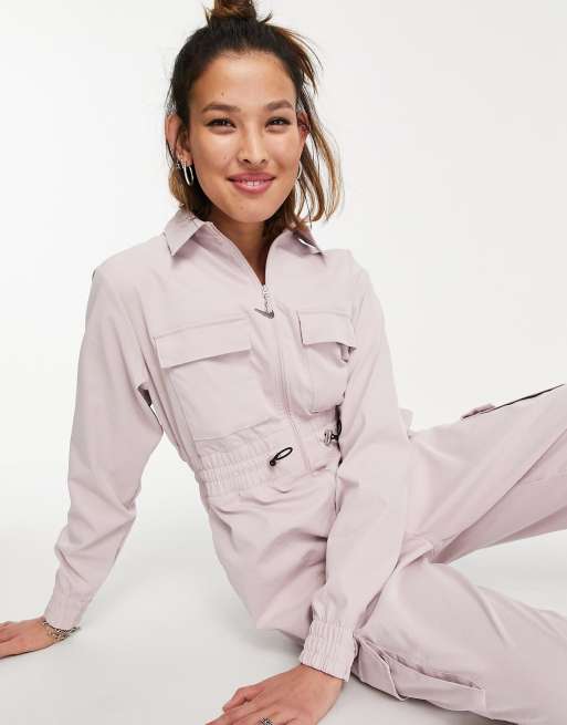 Nike Swoosh utility jumpsuit in light pink