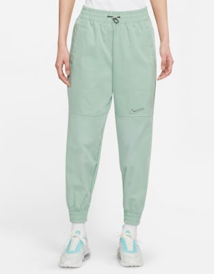 green nike bottoms