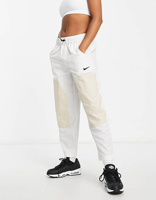 Nike Swoosh woven high waist paneled pants in cream