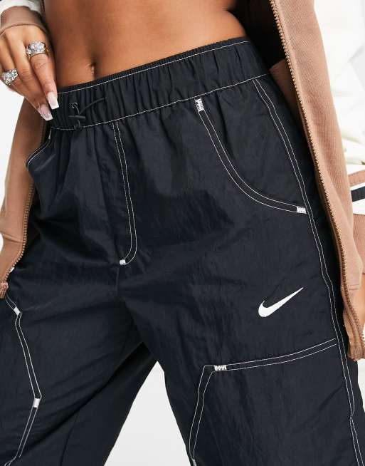 Nike Swoosh woven high-waisted panelled pants in black | ASOS