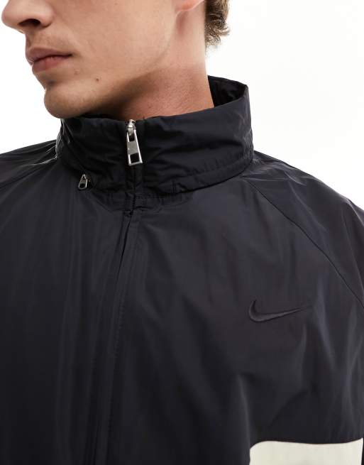 Nike Swoosh Woven jacket in black and cream