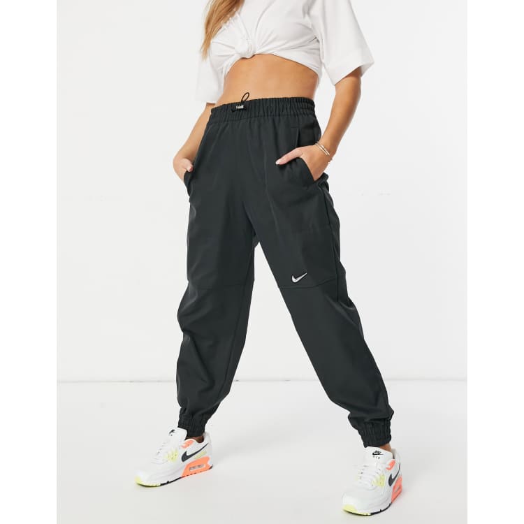 Nike Swoosh woven joggers in black ASOS