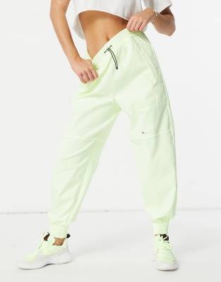 Nike Sportswear Swoosh Women s Woven Pants In Barely Volt barely