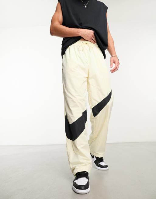 Nike store swoosh trousers