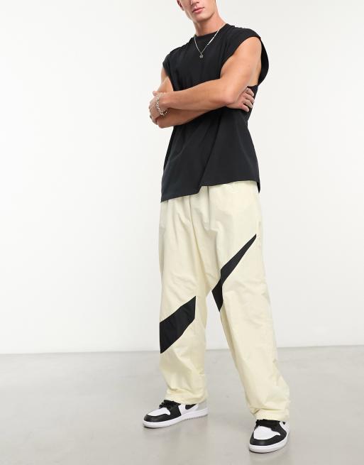 Nike Swoosh woven trousers in cream