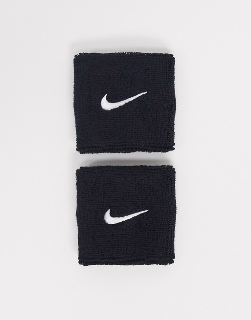 Nike swoosh wristbands in black