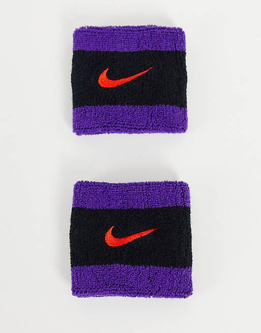 Nike Swoosh wristbands in purple
