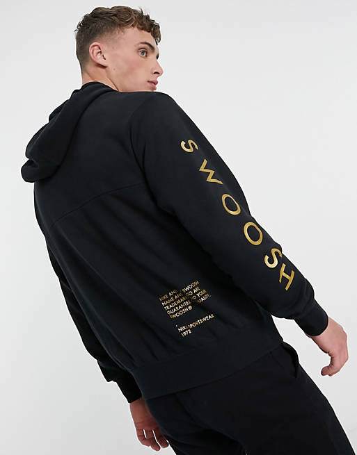 Recientemente Entretenimiento deuda Nike Swoosh zip hoodie in black and gold | ASOS