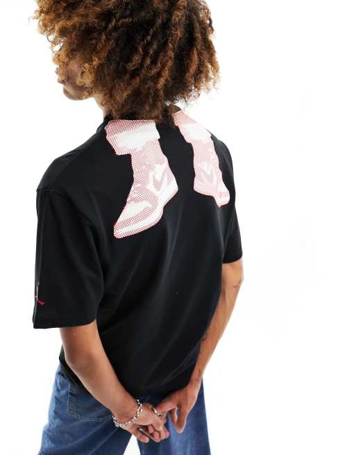 Nike - T-shirt à imprimé graphique festif - Noir 