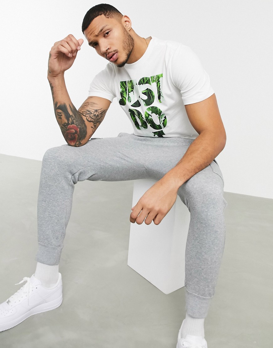 Nike - T-shirt bianca con logo Just Do It-Bianco