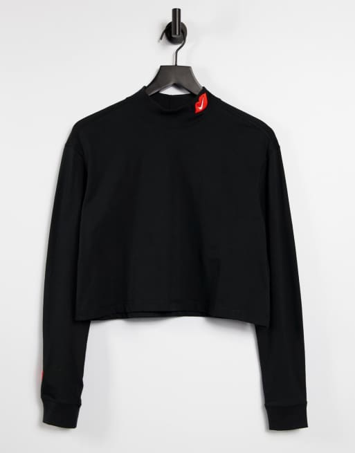 Nike - T-shirt dolcevita a maniche lunghe in nero con logo Nike a forma di bacio