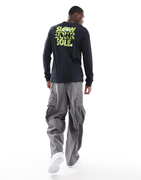 Nike - T-shirt met lange mouwen en print in zwart - view 1
