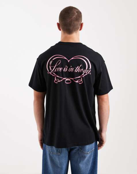 Nike - T-shirt nera con grafica stampata a cuore sul retro - view 1