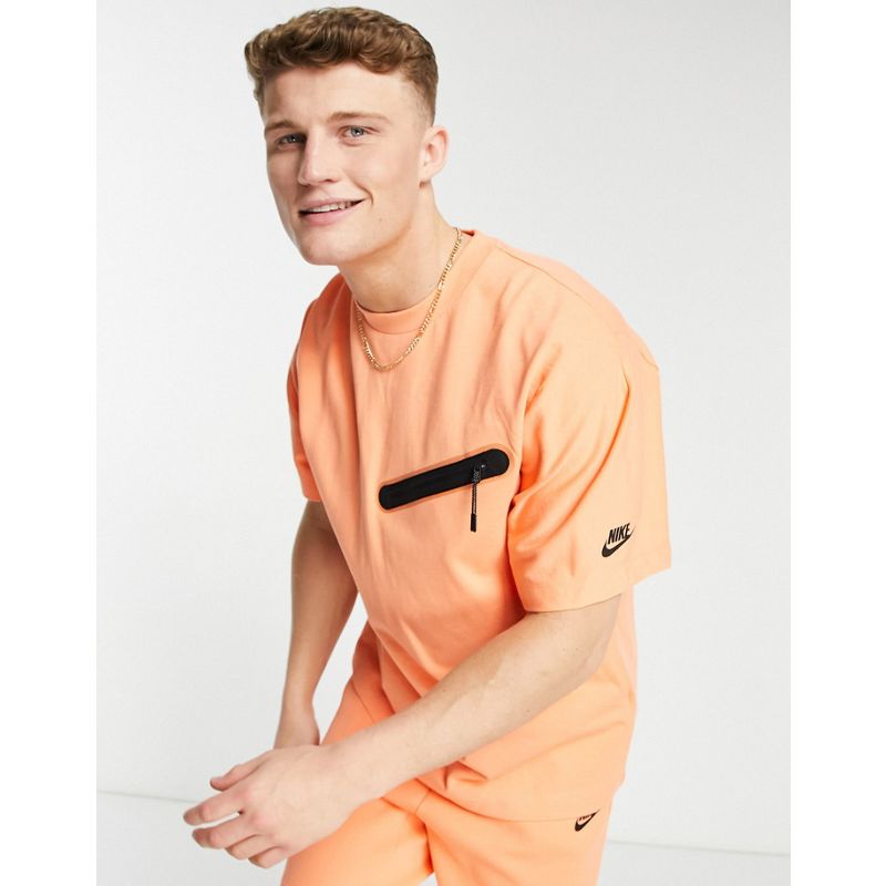 Top Activewear Nike - T-shirt tecnica felpata arancione polvere
