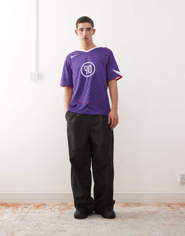 Nike T90 Dri-FIT football shirt in purple | ASOS