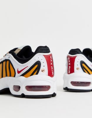 white and orange trainers