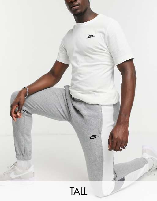Nike Tall cuffed trackies in dark grey | ASOS