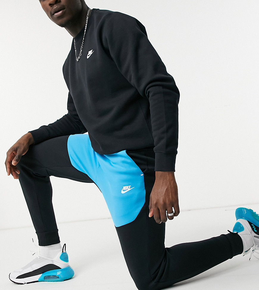 Nike Tall Tech Fleece color-block sweatpants in black and blue