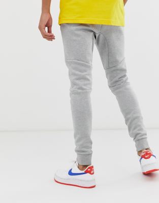 Nike Tall Tech Fleece cuffed jogger in grey ASOS