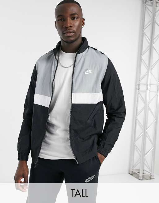 Nike Tall woven track jacket in black and gray