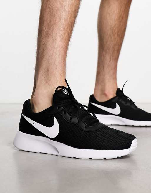 Nike black hot sale and white tanjun