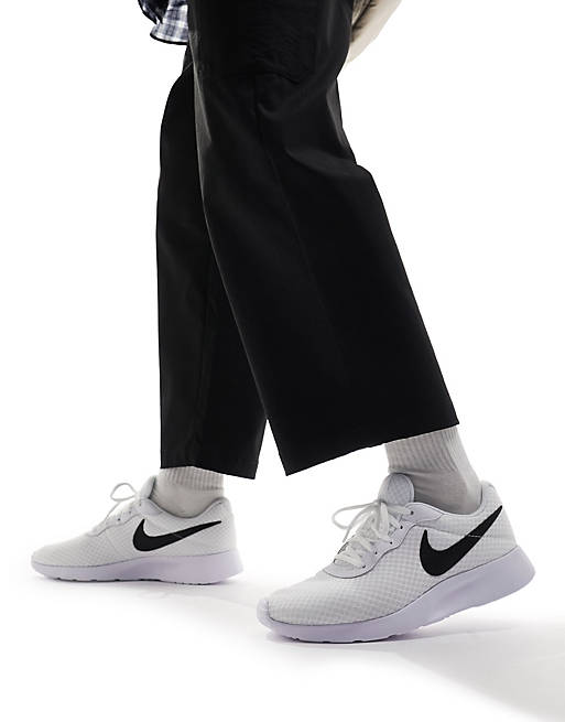 Nike Tanjun sneakers in triple white and black | ASOS