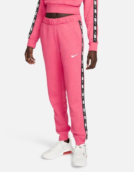 https://images.asos-media.com/products/nike-tape-pack-regular-fit-cuffed-fleece-sweatpants-in-dusty-pink/200630796-1-dustypink?$n_550w$&wid=550&fit=constrain
