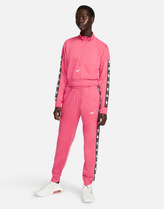 https://images.asos-media.com/products/nike-tape-pack-regular-fit-cuffed-fleece-sweatpants-in-dusty-pink/200630796-4?$n_550w$&wid=550&fit=constrain