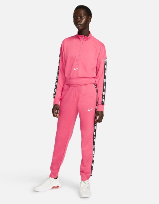 https://images.asos-media.com/products/nike-tape-pack-regular-fit-cuffed-fleece-sweatpants-in-dusty-pink/200630796-4?$n_550w$&wid=550&fit=constrain