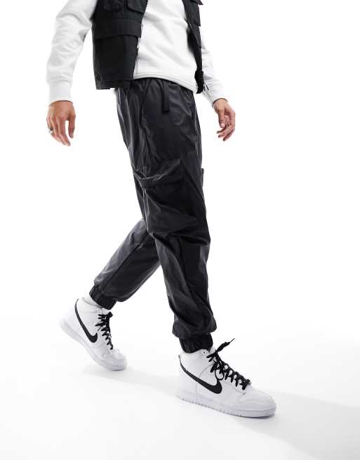 Nike tech sweatpants online black