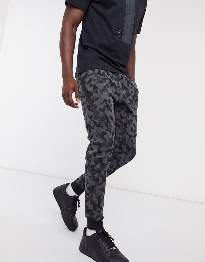 Nike Tech Fleece all over print joggers in black