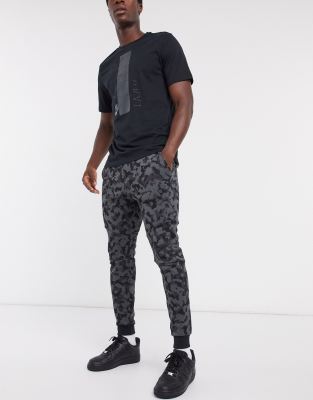 nike all over print sweatpants