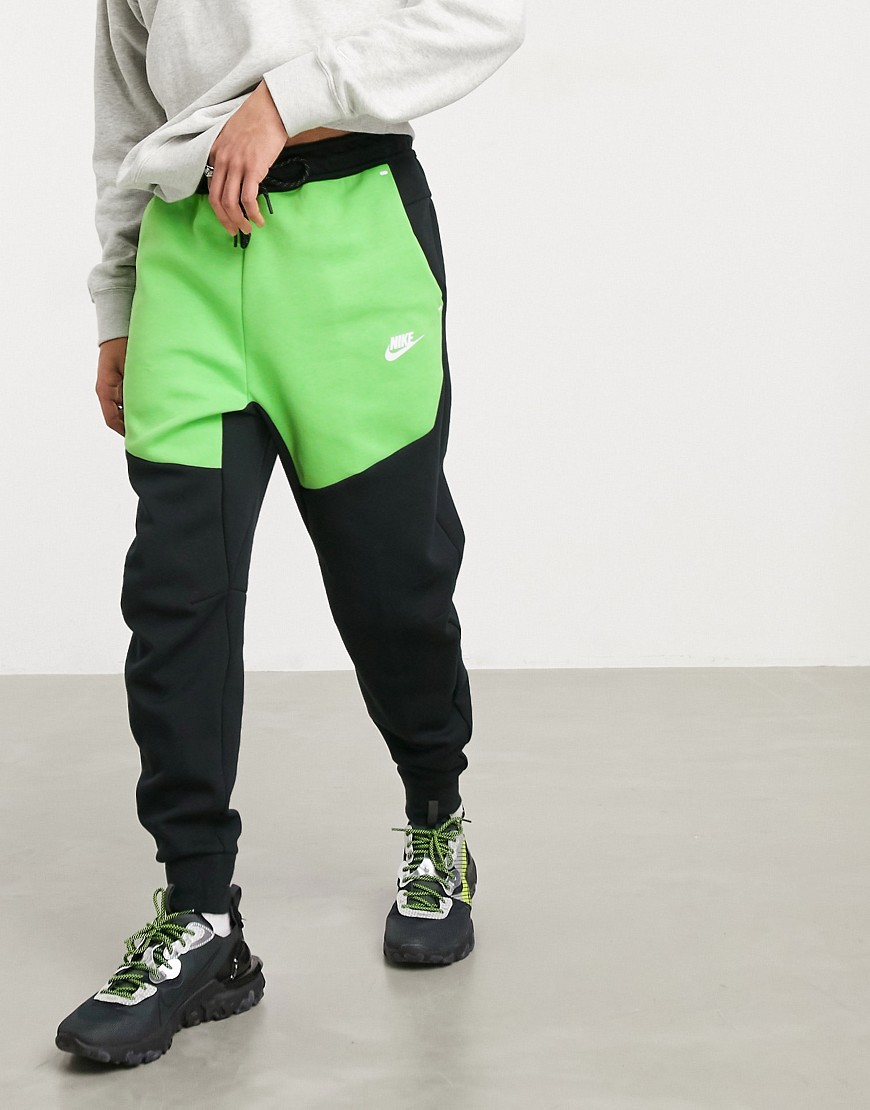 Nike Tech Fleece colorblock sweatpants in black/green