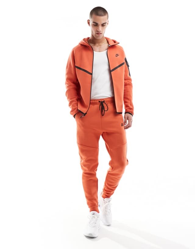 Nike Tech Fleece full zip hoodie in orange | ASOS