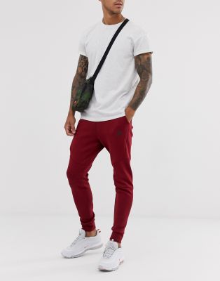 nike tech fleece burgundy pants