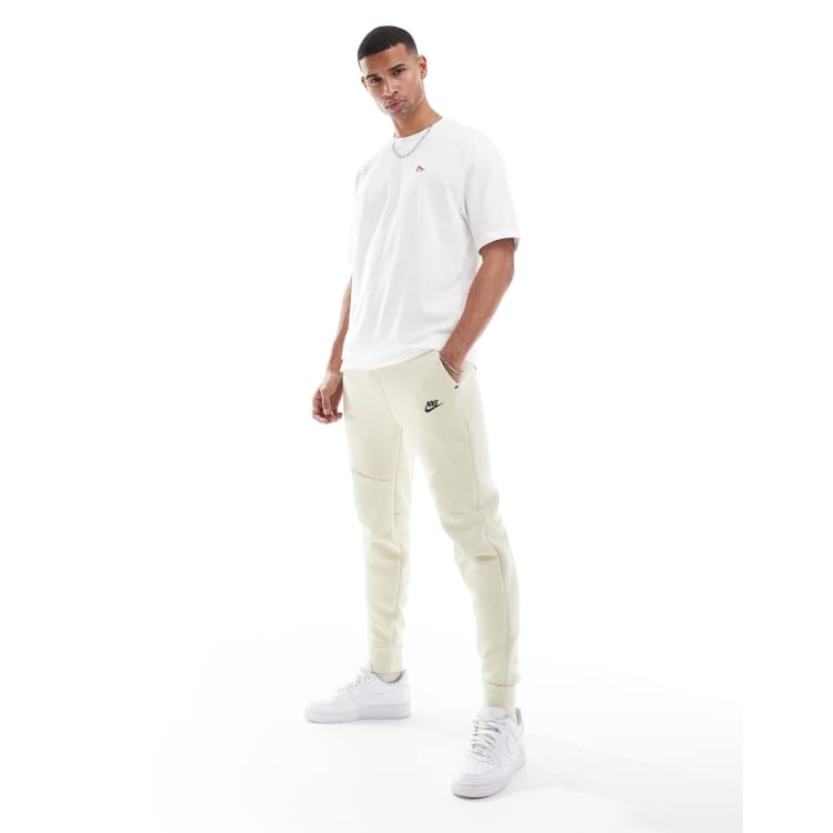 Nike Tech Fleece jogger in beige ASOS