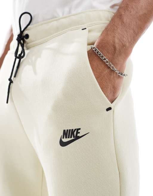 Nike Tech Fleece jogger in beige ASOS