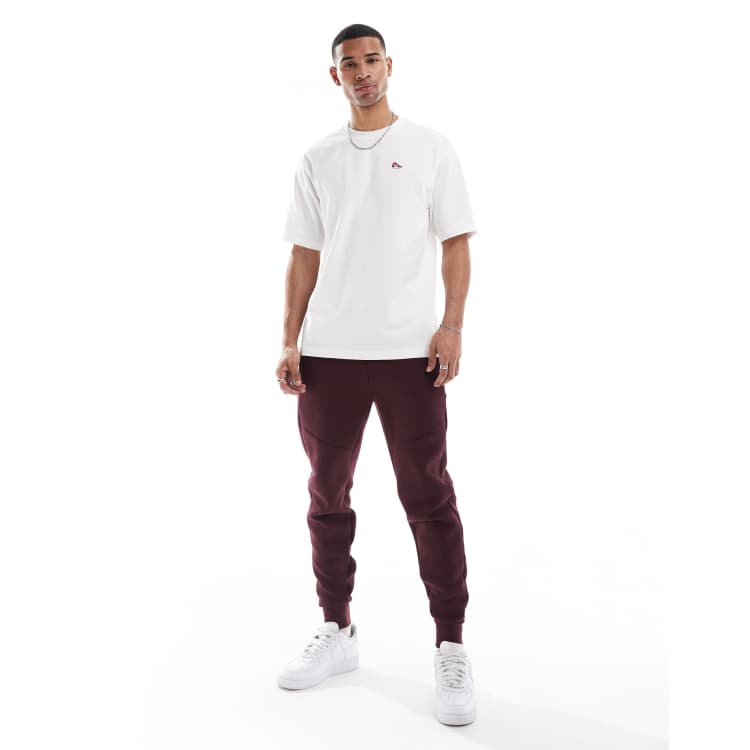 Nike Tech Fleece jogger in burgundy ASOS
