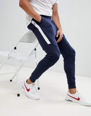 nike tech navy bottoms