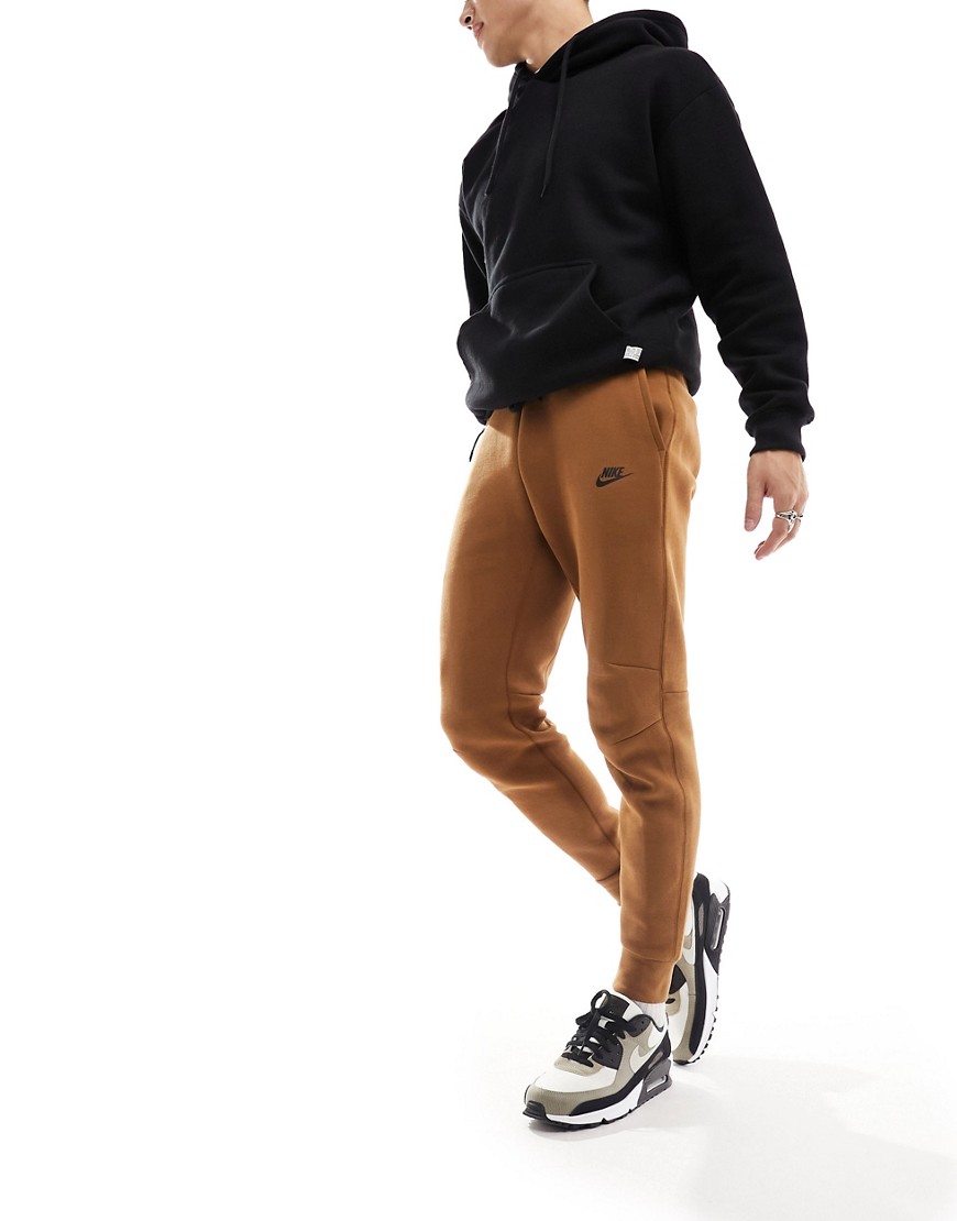 Nike Tech Fleece joggers in brown