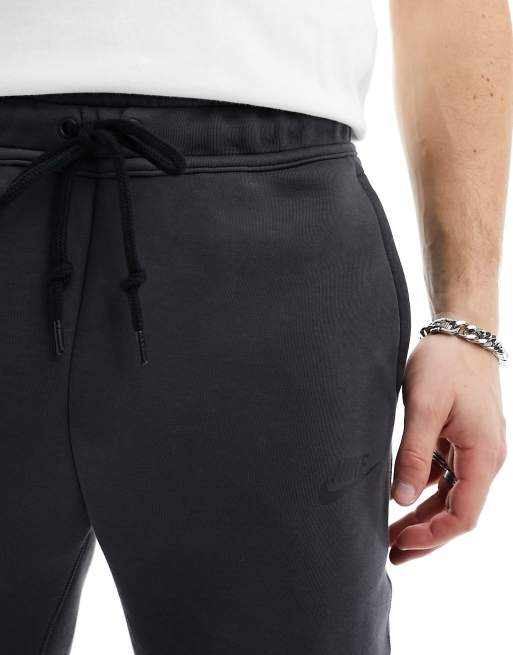 Nike Tech Fleece joggers in dark grey ASOS